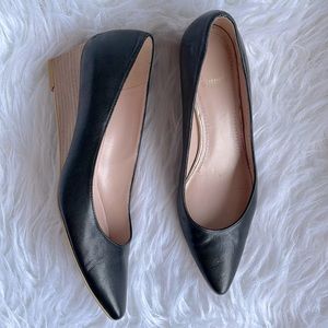 Stuart Weitzman patent leather pointed toe wedge shoes